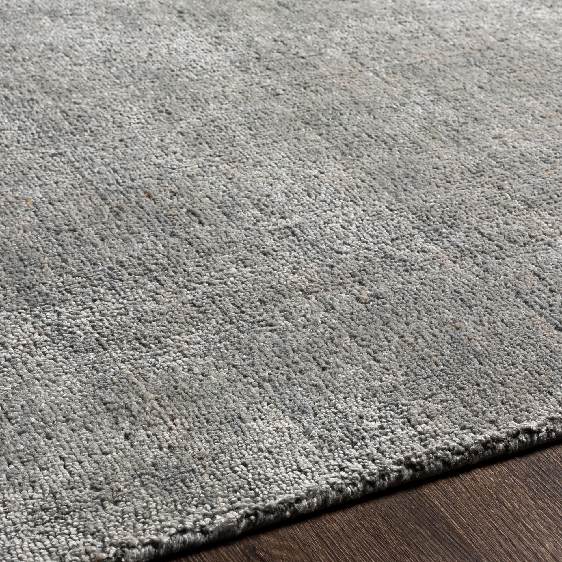 Helen HLE-2304 Rug by Surya. Made from 50% viscose, 50% wool in a unique style.