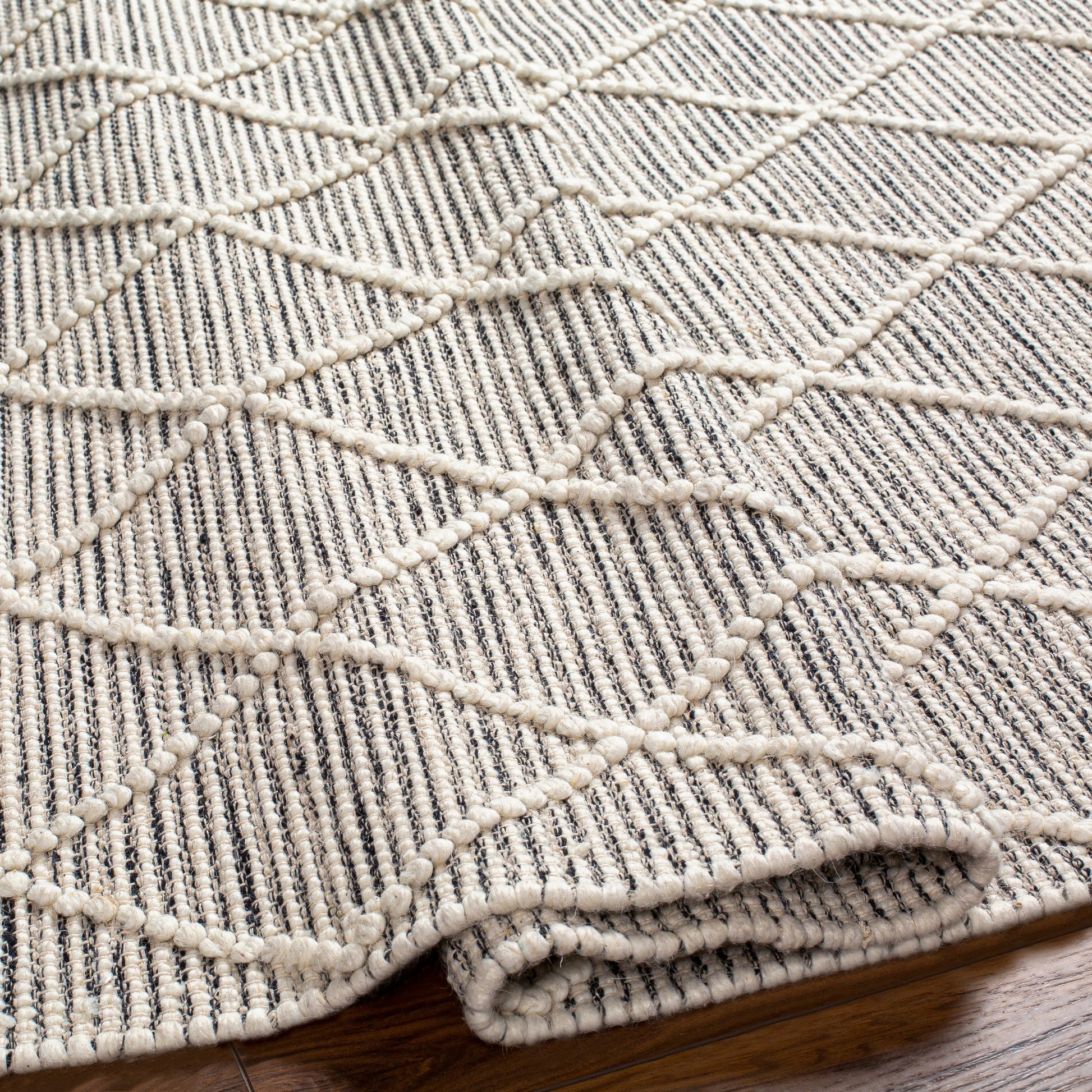 Hemingway Rug - 31309 by Livabliss in ivory, black. Made from 60% wool, 40% polyester in a unique style.