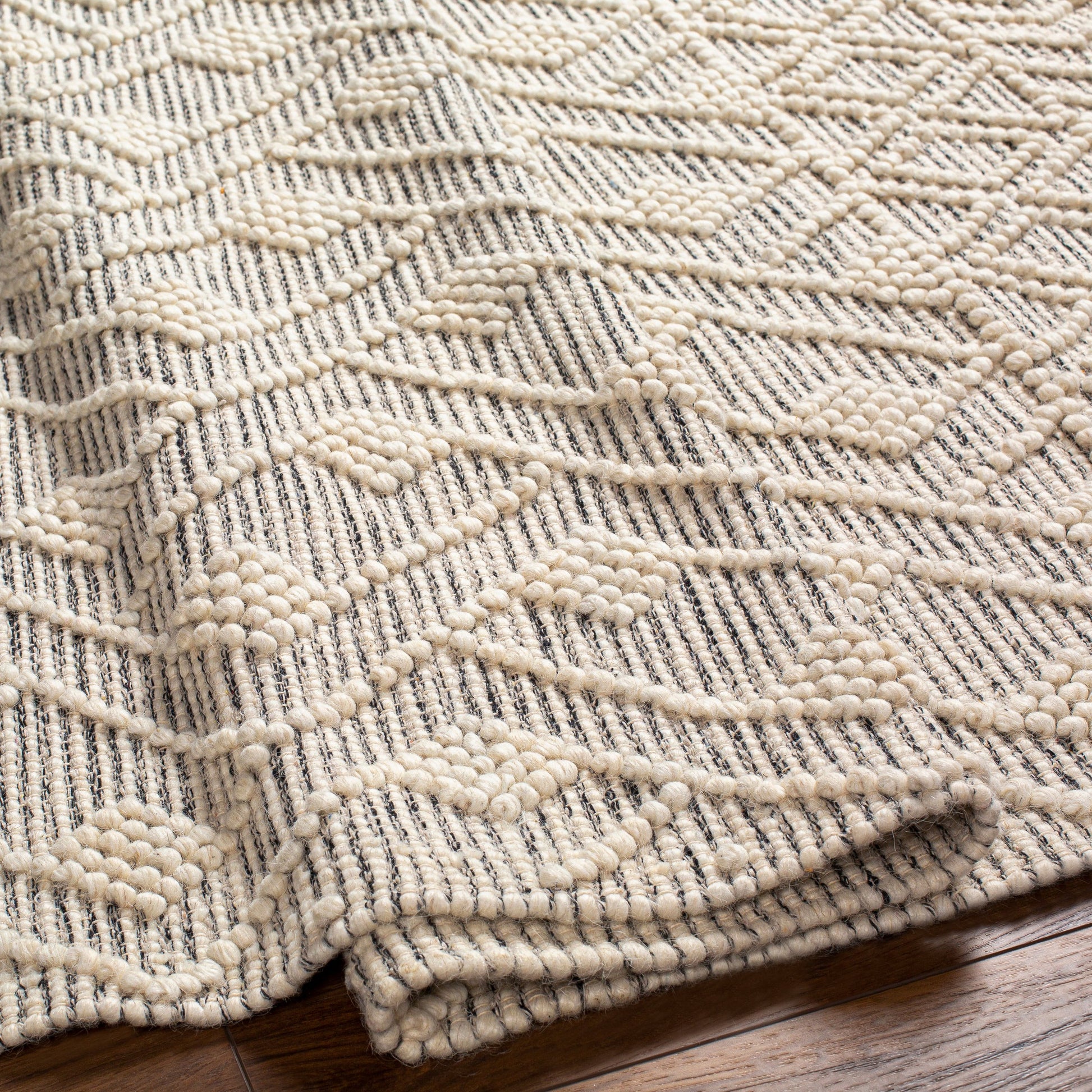 Hemingway Rug - 31312 by Livabliss in ivory, black. Made from 60% wool, 40% polyester in a unique style.