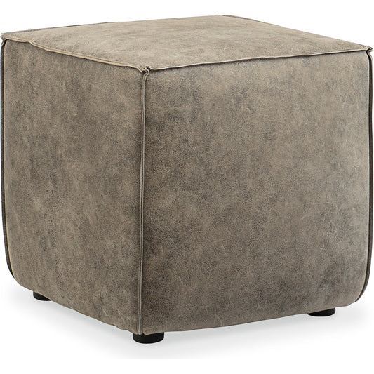 Quebert Ottoman by Hooker Furniture in grey and old school era. Made from leather in a rustic style.