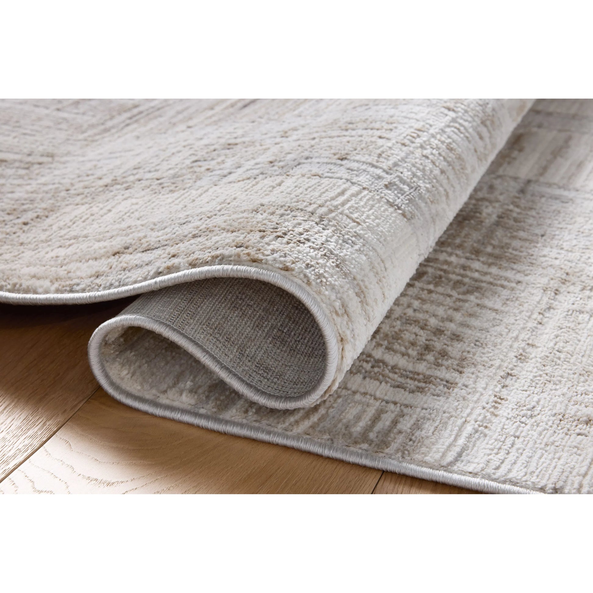 Hollis HOL-02 Rug by Loloi in pebble, ivory. Made from 100% polyester in a unique style.