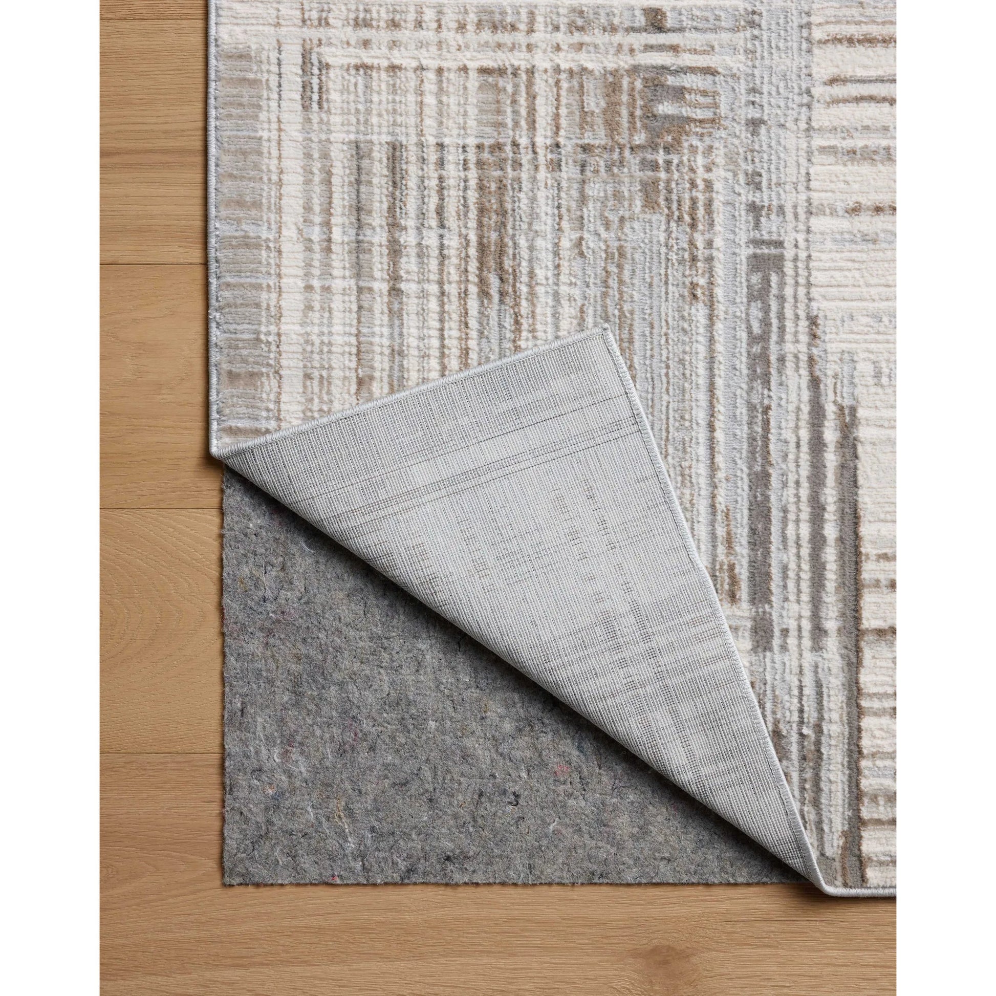 Hollis HOL-02 Rug by Loloi in pebble, ivory. Made from 100% polyester in a unique style.