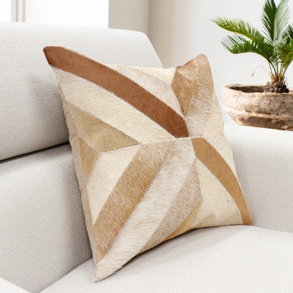 Safari Cowhide Throw Pillow by Pasargad Home in l. brown. Made from cowhide in a modern style.