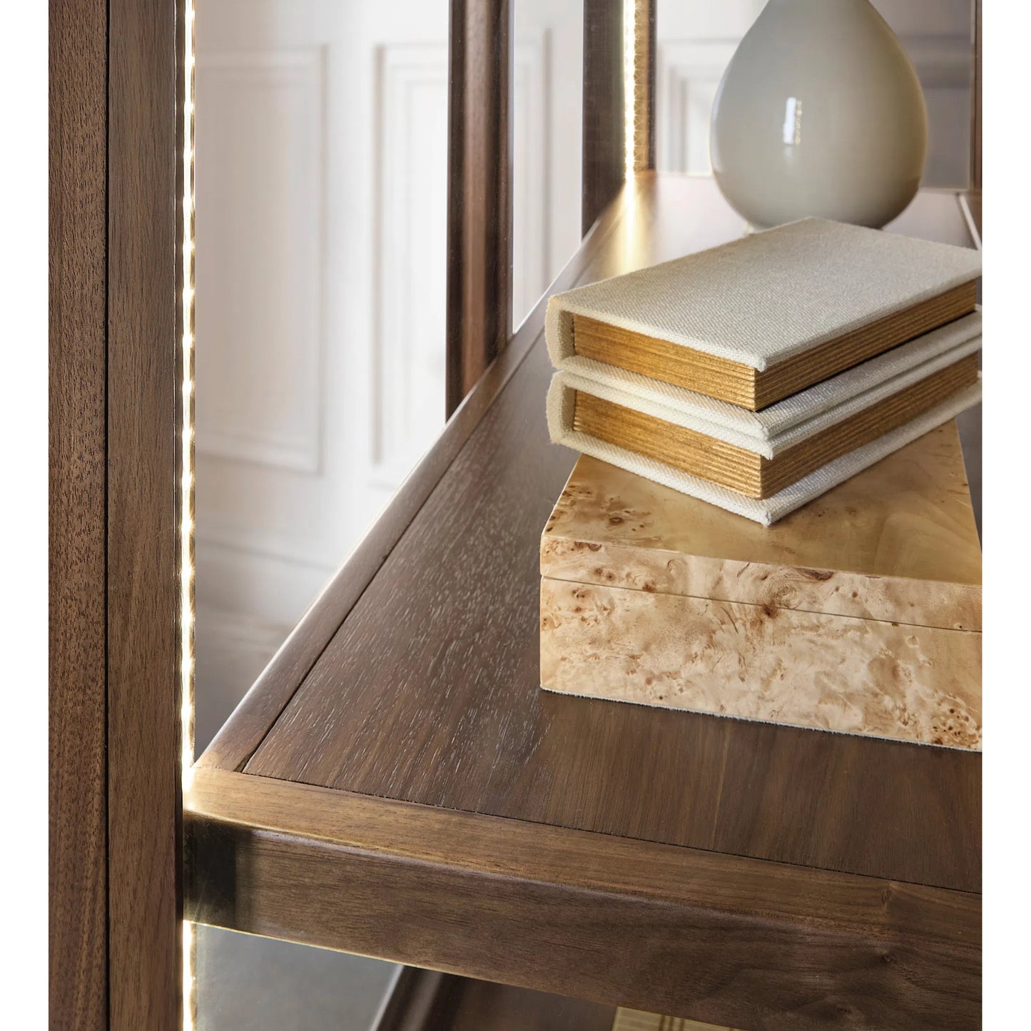 007 SI-2458571 | Closeup | Eleana Display Cabinet by Hooker Furniture in light caramel, quartered walnut veneers. Made from walnut veneers, glass, wall cover in a traditional style.