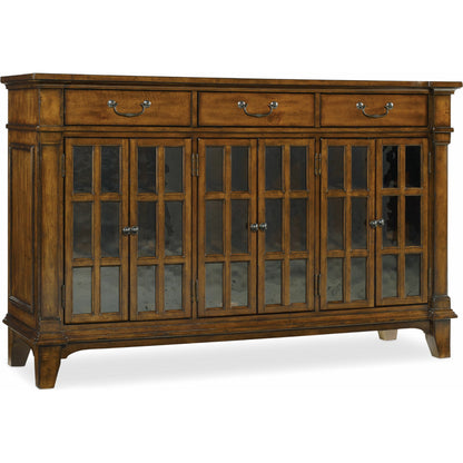 Tynecastle Buffet by Hooker Furniture in chestnut. Made from alder veneers, seeded glass in a traditional style.