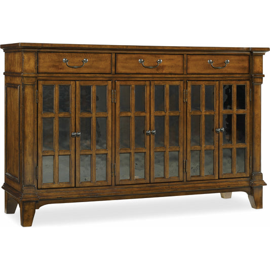Tynecastle Buffet by Hooker Furniture in chestnut. Made from alder veneers, seeded glass in a traditional style.