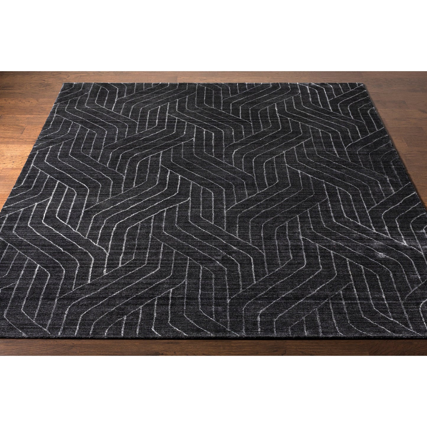003 102278-26644,102278-26645,102278-26646,102278-26710,102278-26711 | Closeup | Hightower Rug - 23234 by Surya in charcoal. Made from 100% viscose in a unique style.