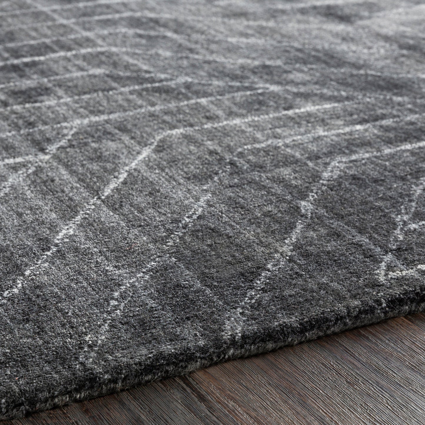 004 102278-26644,102278-26645,102278-26646,102278-26710,102278-26711 | Closeup | Hightower Rug - 23234 by Surya in charcoal. Made from 100% viscose in a unique style.