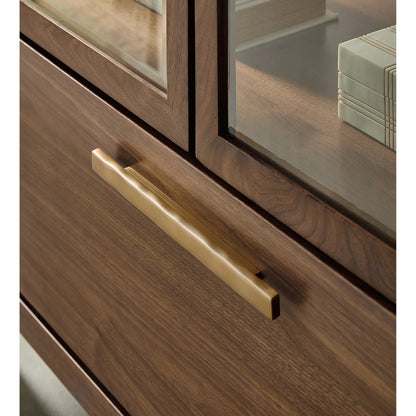 Eleana Display Cabinet by Hooker Furniture in light caramel, quartered walnut veneers. Made from walnut veneers, glass, wall cover in a traditional style.