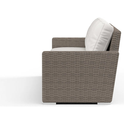 Coronado Outdoor Sofa in Canvas Flax by Sunset West in driftwood. Made from resin wicker in a modern style.