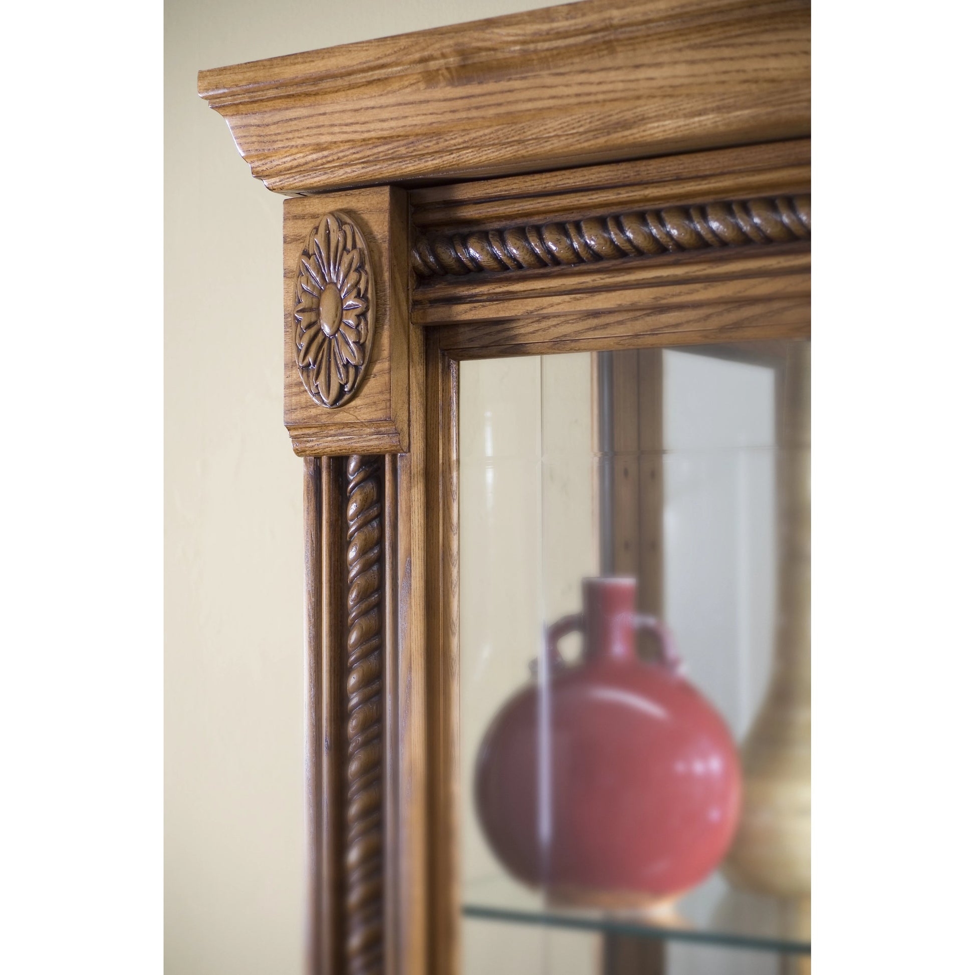 43'' Wide Hardwood Two Way Sliding Door Curio Cabinet in Warm Honey by Pulaski Furniture in warm honey-tone. Made from hardwood solids in a traditional style.