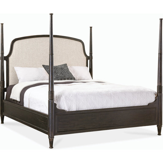 Americana Queen Upholstered Poster Bed by Hooker Furniture in beige and molasses. Made from oak veneers and fabric in a modern style.