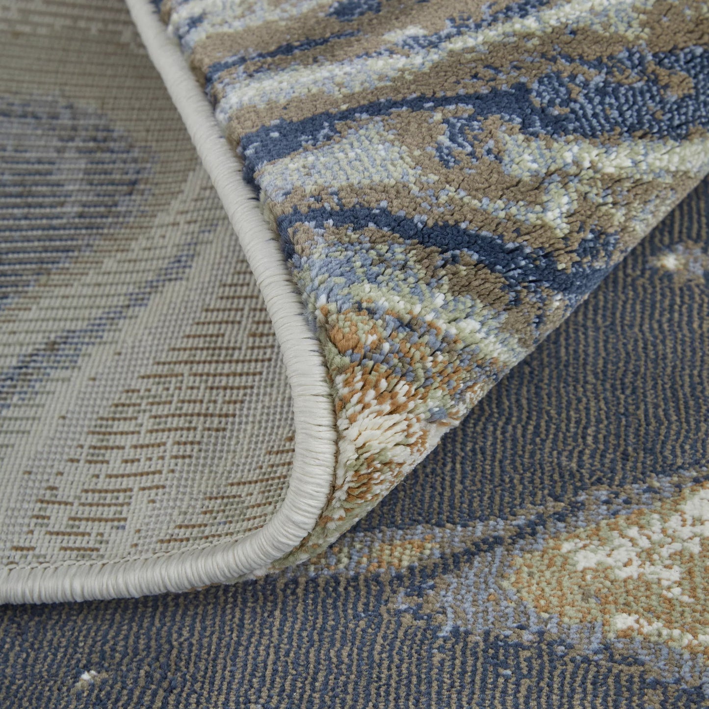 006 SI-2518387,SI-2518388 | Closeup | Mandana CME39M1F Rug by Feizy in ivory, taupe, blue. Made from polyester, polypropylene in a unique style.