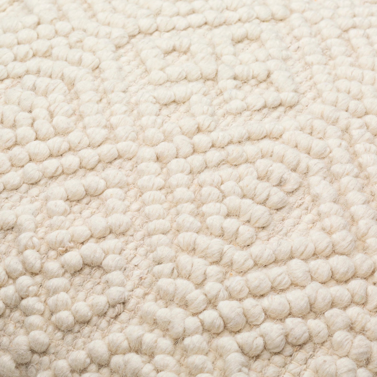 004 SI-1882675,SI-1882676 | Closeup | Hygge Pillow - 11322 by Livabliss in cream. Made from 40% cotton, 30% polyester, 30% wool, 100% cotton in a eclectic & global style.