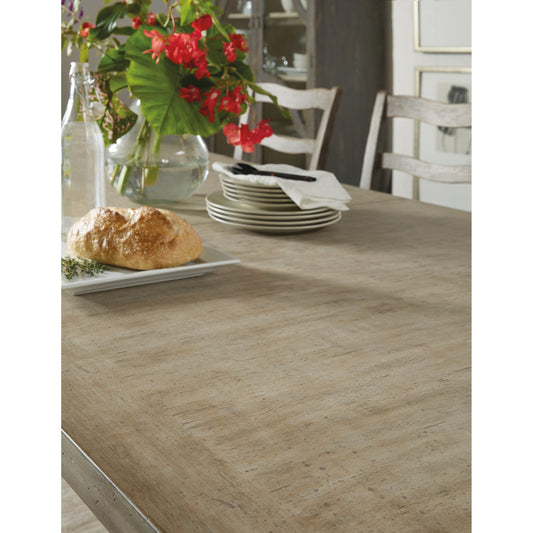 Vittorio Dining Table by Hooker Furniture in light tusk. Made from oak veneers with solid-wood edge top in a eclectic & global style.