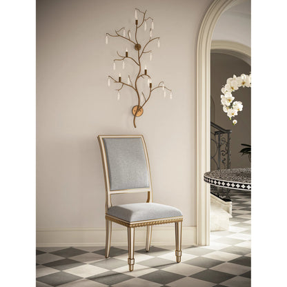 Ines Chair by Currey and Company in mixology moonstone and ivory, antique gold. Made from mahogany in a transitional style.