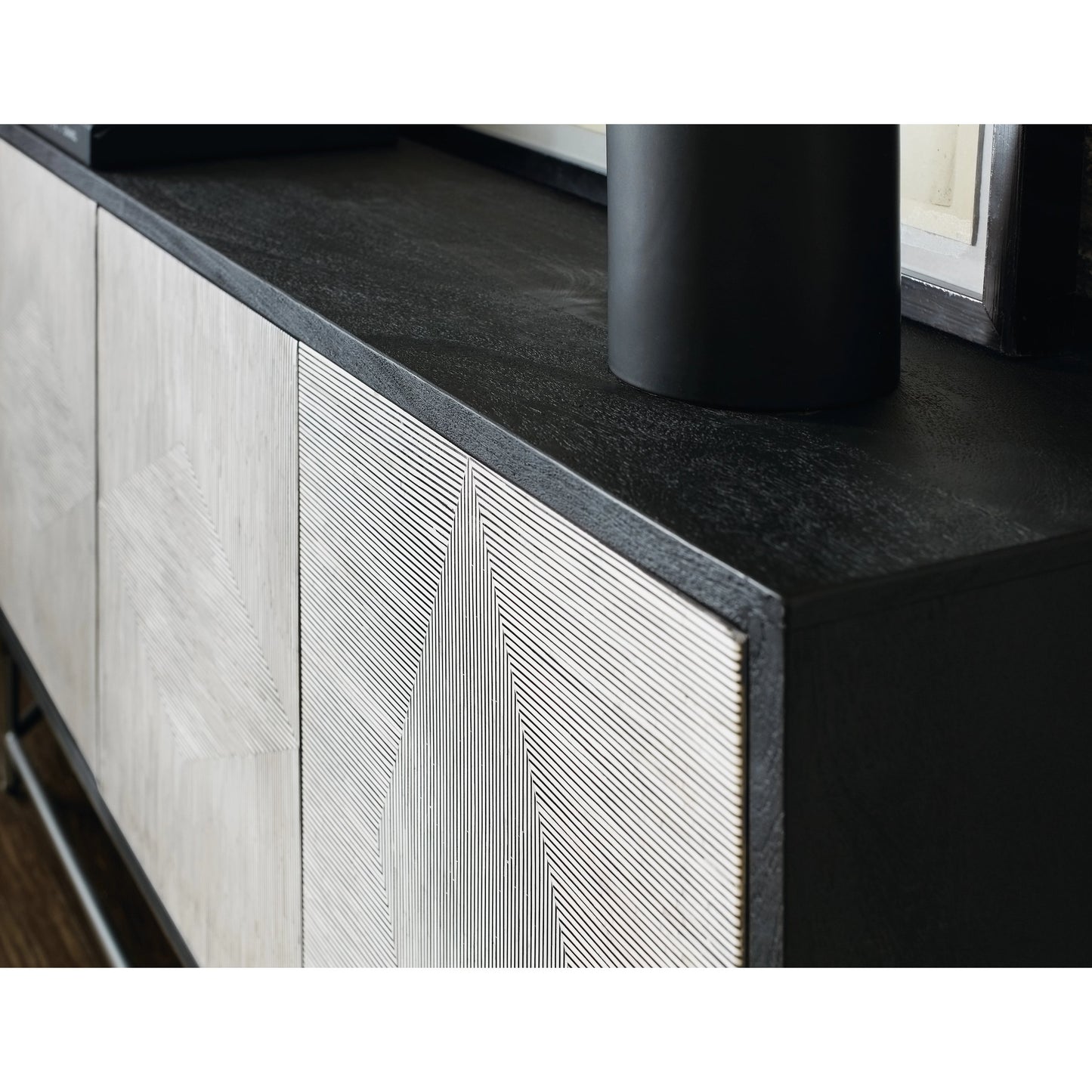 005 SI-2133792 | Closeup | Commerce and Market Fine Lines Credenza by Hooker Furniture in black. Made from mango solids, bone, iron in a modern style.
