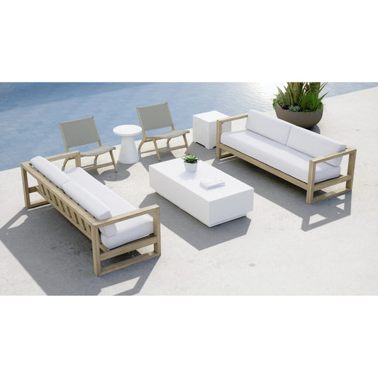 Coastal Outdoor Teak Cushionless Accent Chair by Sunset West in teak. Made from teak in a coastal style.