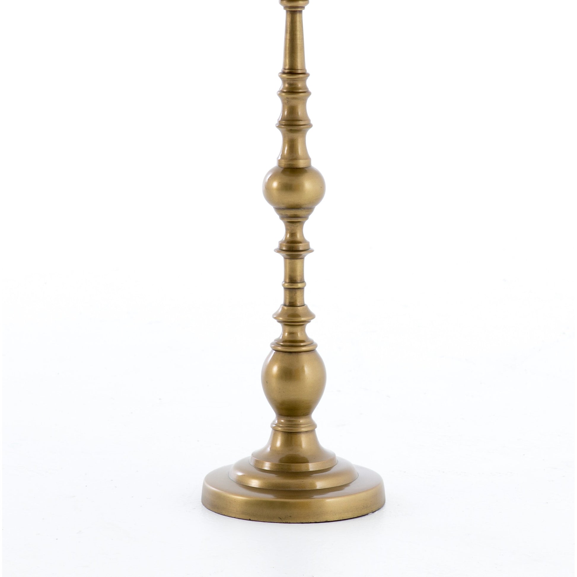 Calhoun End Table by Four Hands in antique brass. Made from aluminum, engineered hardwood in a transitional style.