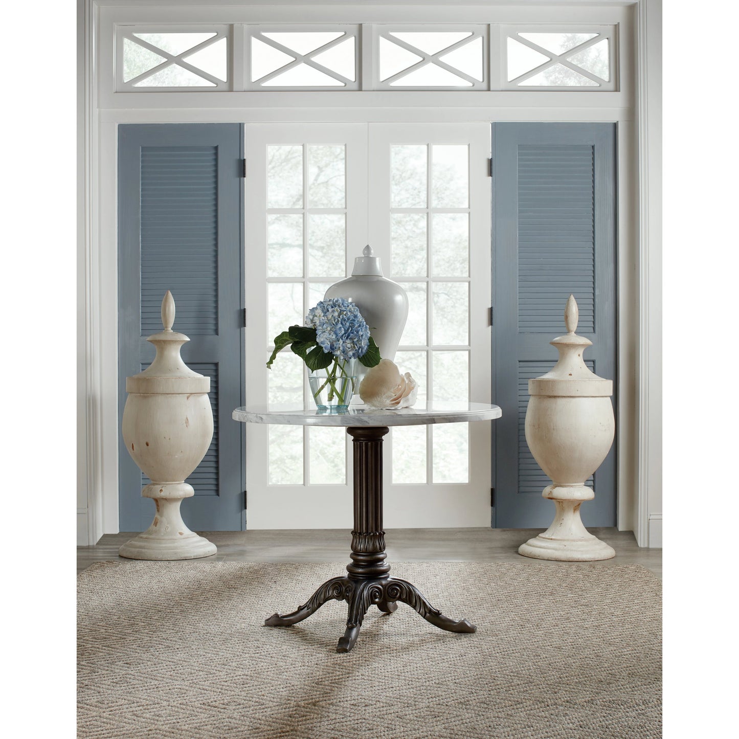 008 SI-2028977 | Lifestyle | Charleston Bistro Table by Hooker Furniture in garden gate black. Made from resin with veneered carrara stone in a modern style.