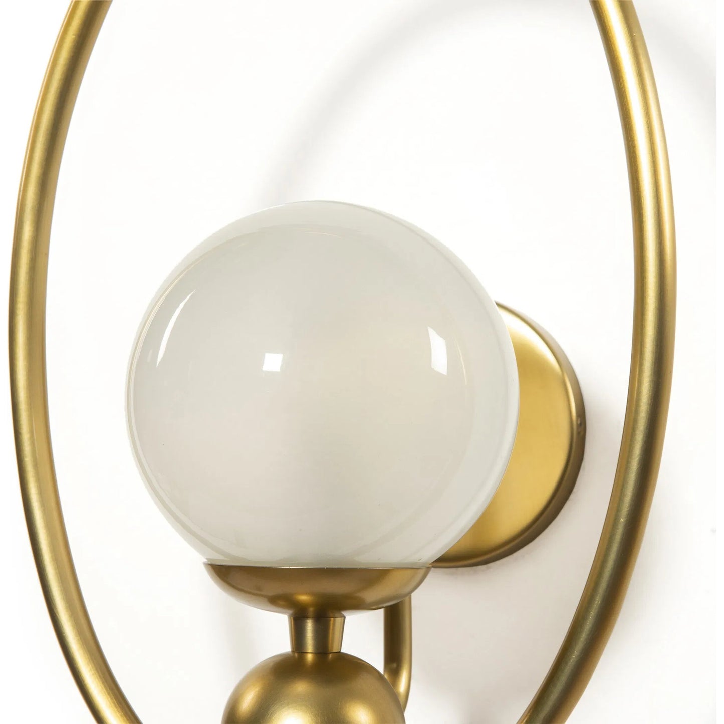 002 SI-2513260 | Closeup | Elliot Sconce by Four Hands in frosted glass, patina brass. Made from glass, brass in a modern style.