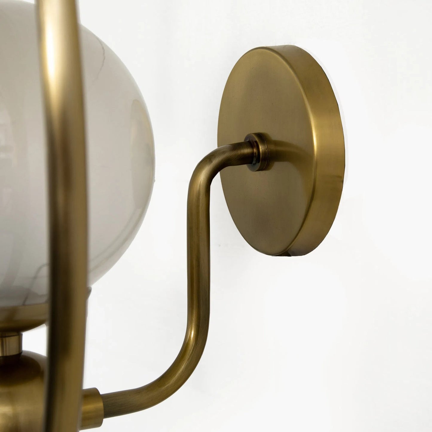 004 SI-2513260 | Closeup | Elliot Sconce by Four Hands in frosted glass, patina brass. Made from glass, brass in a modern style.