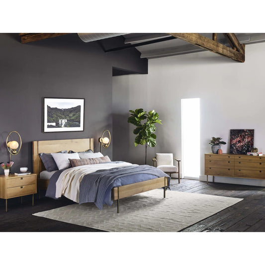 Elliot Sconce by Four Hands in frosted glass, patina brass. Made from glass, brass in a modern style.