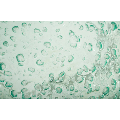 Bubble Glass Coffee Table by Phillips Collection in turquoise. Made from glass metal, stainless steel in a coastal style.