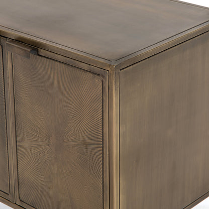 Sunburst Cabinet Nightstand by Four Hands in sunburst etched aged brass, gunmetal, aged brass and sunburst etched aged brass pc, gunmetal, aged brass pc. Made from iron in a modern style.