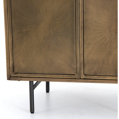 Sunburst Cabinet Nightstand by Four Hands in sunburst etched aged brass, gunmetal, aged brass and sunburst etched aged brass pc, gunmetal, aged brass pc. Made from iron in a modern style.