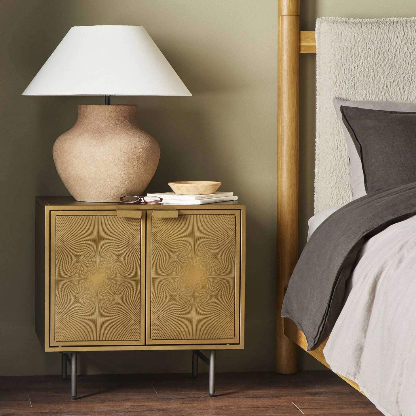 025 SR-369245 | Lifestyle | Sunburst Cabinet Nightstand by Four Hands in sunburst etched aged brass, gunmetal, aged brass and sunburst etched aged brass pc, gunmetal, aged brass pc. Made from iron in a modern style.