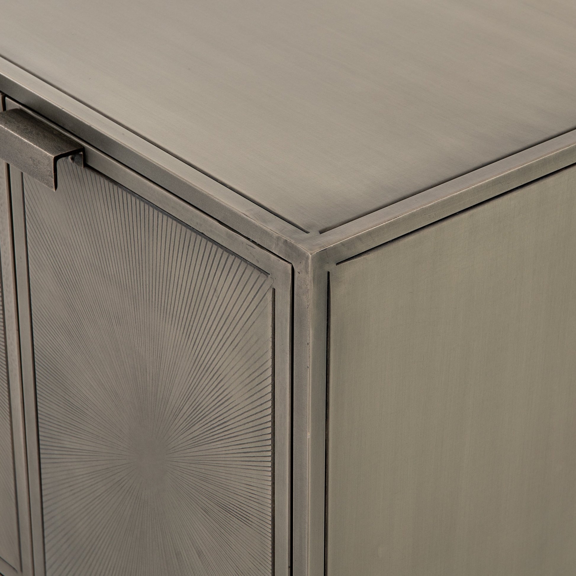 Sunburst Cabinet Nightstand by Four Hands in sunburst etched aged brass, gunmetal, aged brass and sunburst etched aged brass pc, gunmetal, aged brass pc. Made from iron in a modern style.