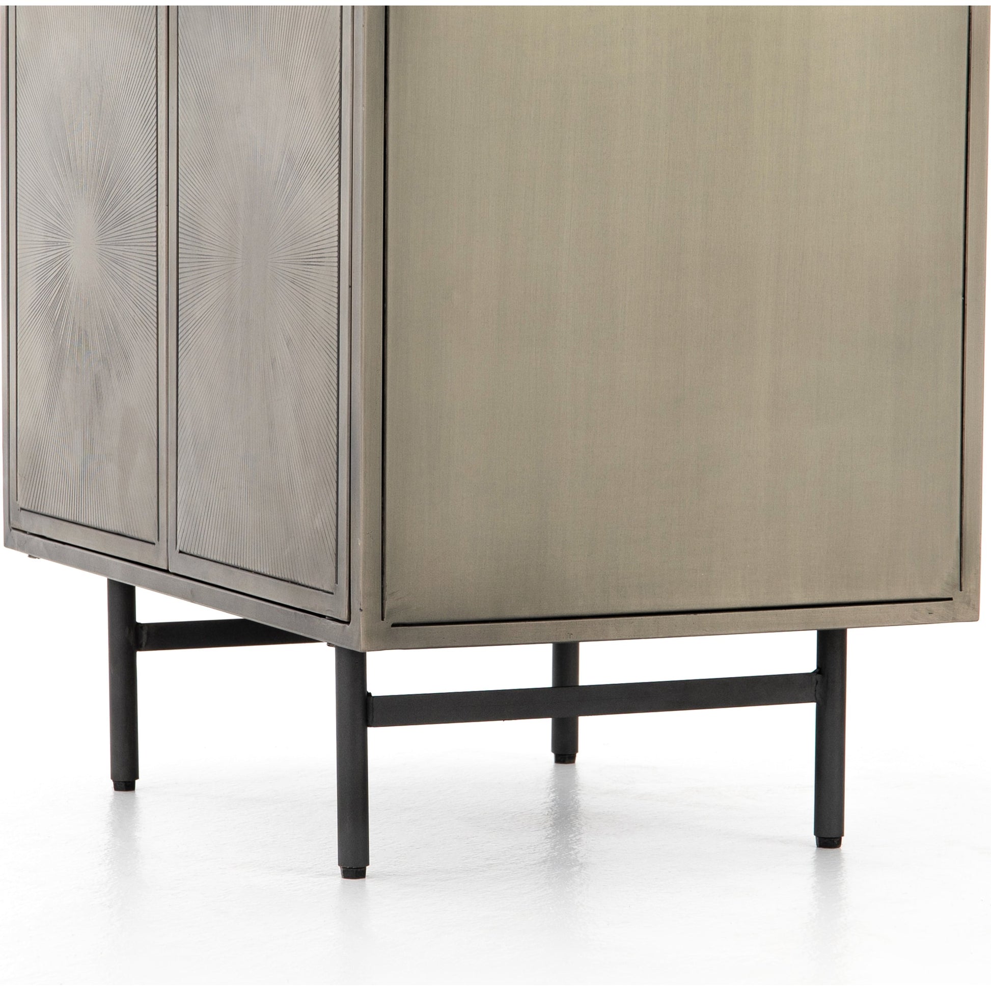 Sunburst Cabinet Nightstand by Four Hands in sunburst etched aged brass, gunmetal, aged brass and sunburst etched aged brass pc, gunmetal, aged brass pc. Made from iron in a modern style.