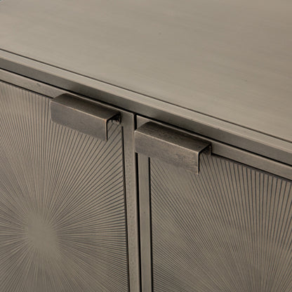 Sunburst Cabinet Nightstand by Four Hands in sunburst etched aged brass, gunmetal, aged brass and sunburst etched aged brass pc, gunmetal, aged brass pc. Made from iron in a modern style.