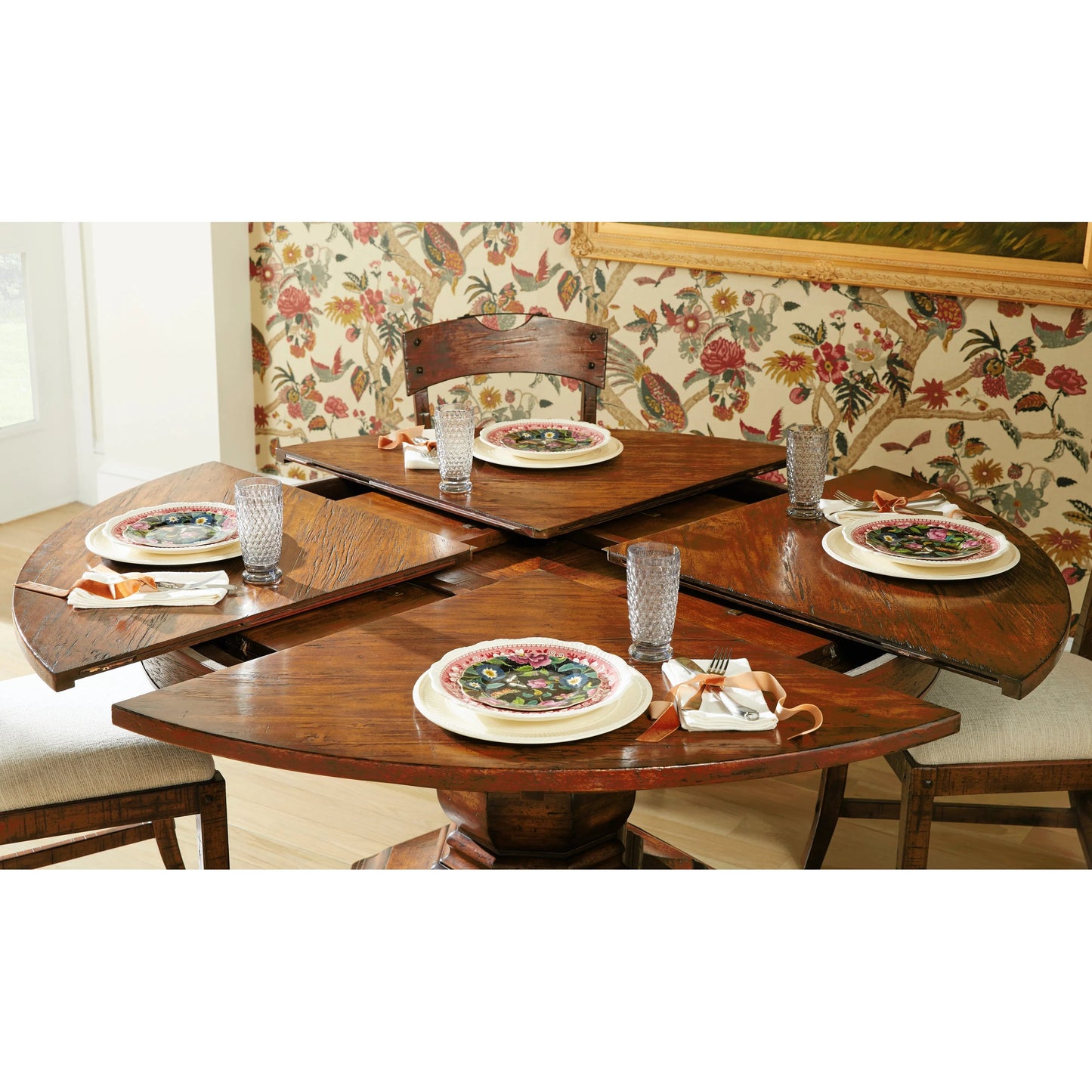 018 SR-846201 | Lifestyle | Casual Accents Country Walnut Round Extendable Dining Table 59" by Jonathan Charles in brown and country farmhouse walnut. Made from acacia in a traditional style.
