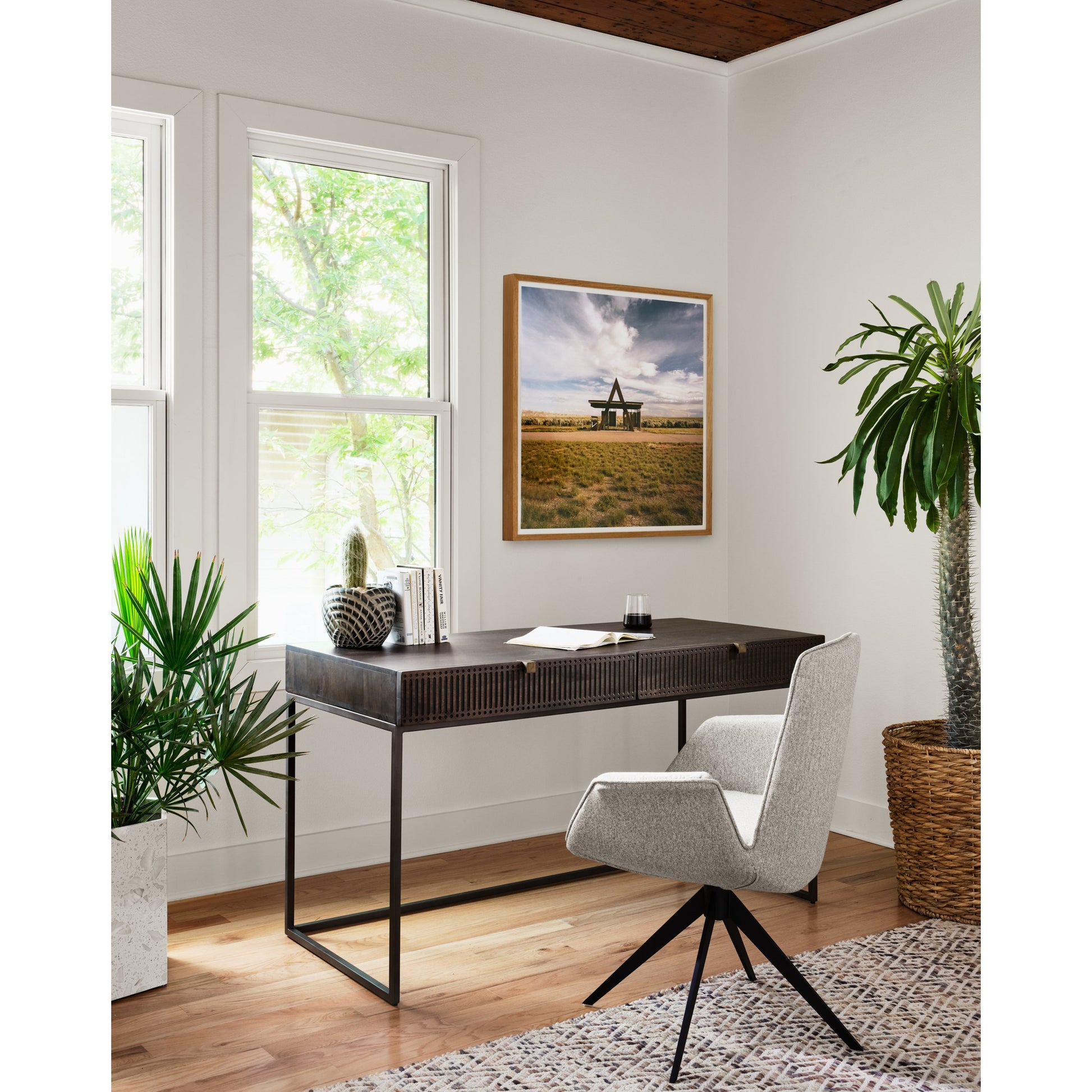 Kelby Writing Desk by Four Hands in aged brass, carved vintage brown, vintage brown, gunmetal and vintage brown. Made from solid mango, iron in a modern style.
