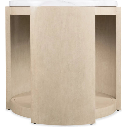 Westwood Round Side Table by Hooker Furniture in polished limestone, quartered oak veneers. Made from glass reinforced concrete, oak veneers, leather, brown leather exterior in a transitional style.