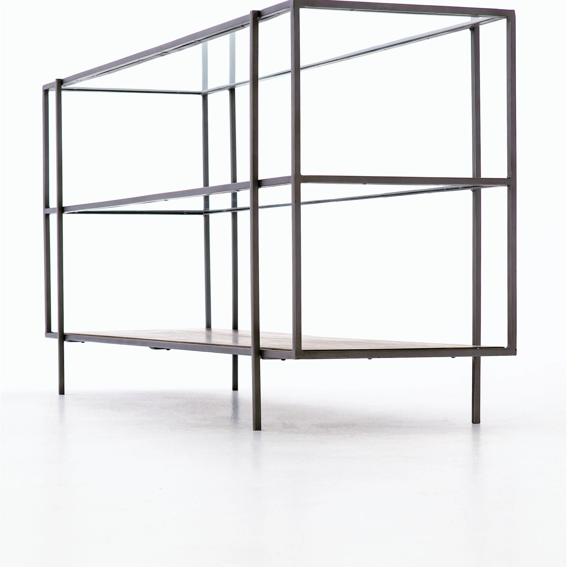 Byron Media Console by Four Hands in aged brown, dark iron, tempered glass. Made from iron, tempered glass, solid mango in a modern style.