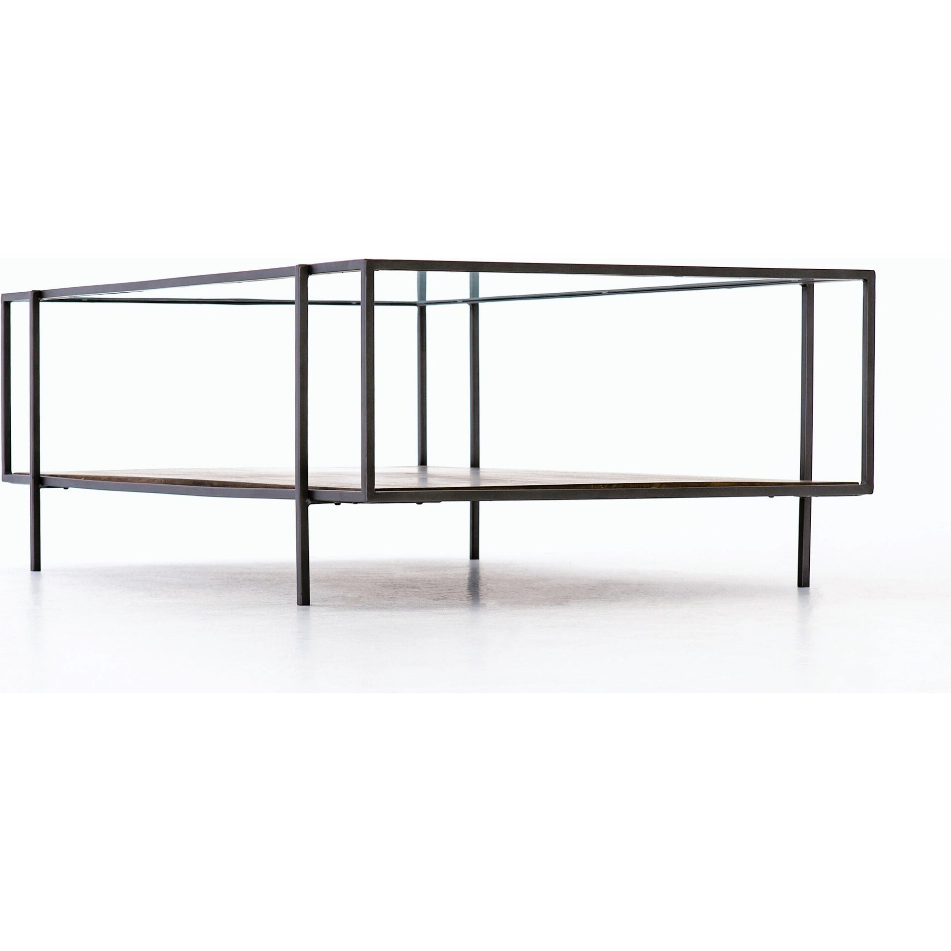 Byron Coffee Table by Four Hands in gunmetal, aged brown, tempered glass and dark iron, aged brown, tempered glass. Made from iron, solid mango, tempered glass in a modern style.