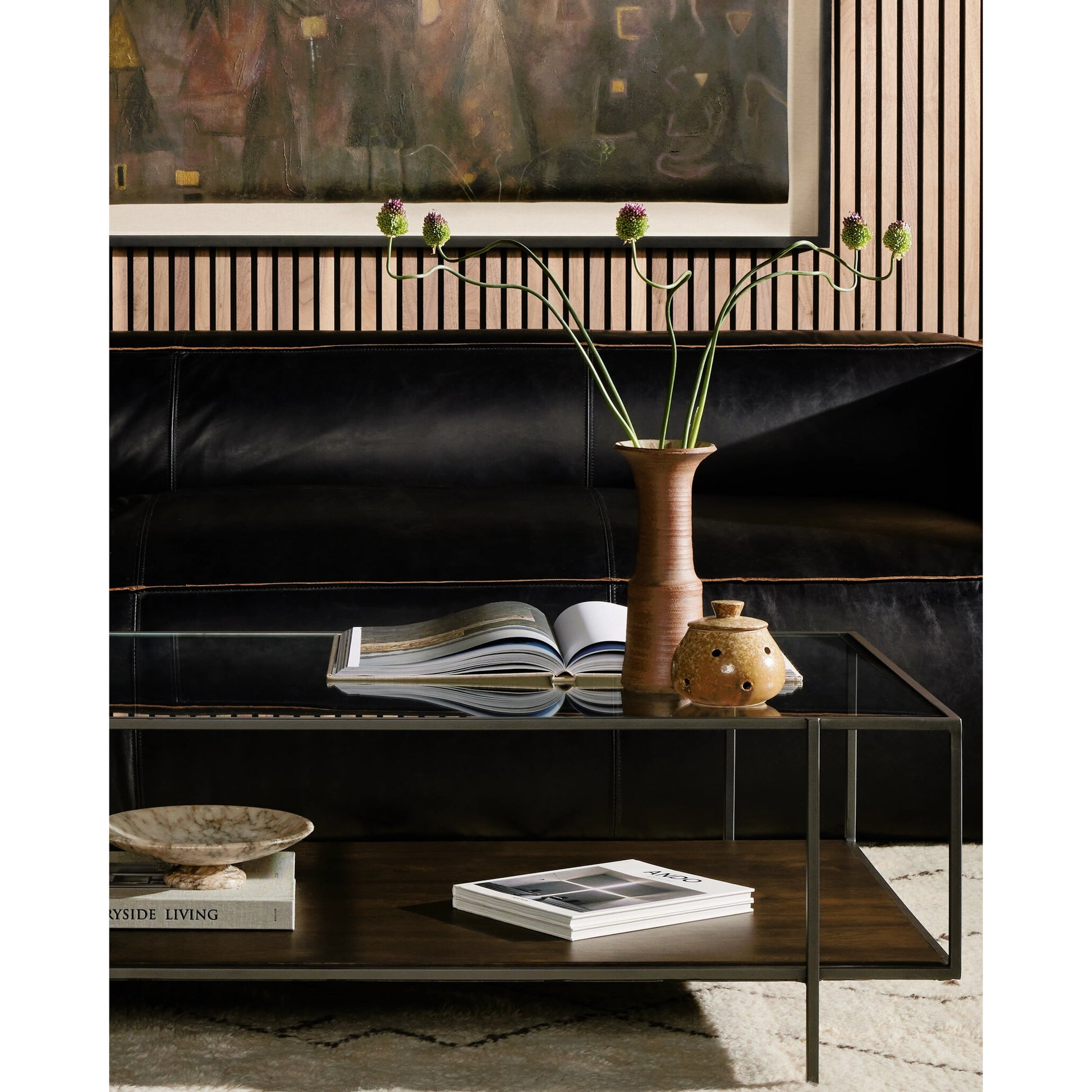 Byron Coffee Table by Four Hands in gunmetal, aged brown, tempered glass and dark iron, aged brown, tempered glass. Made from iron, solid mango, tempered glass in a modern style.