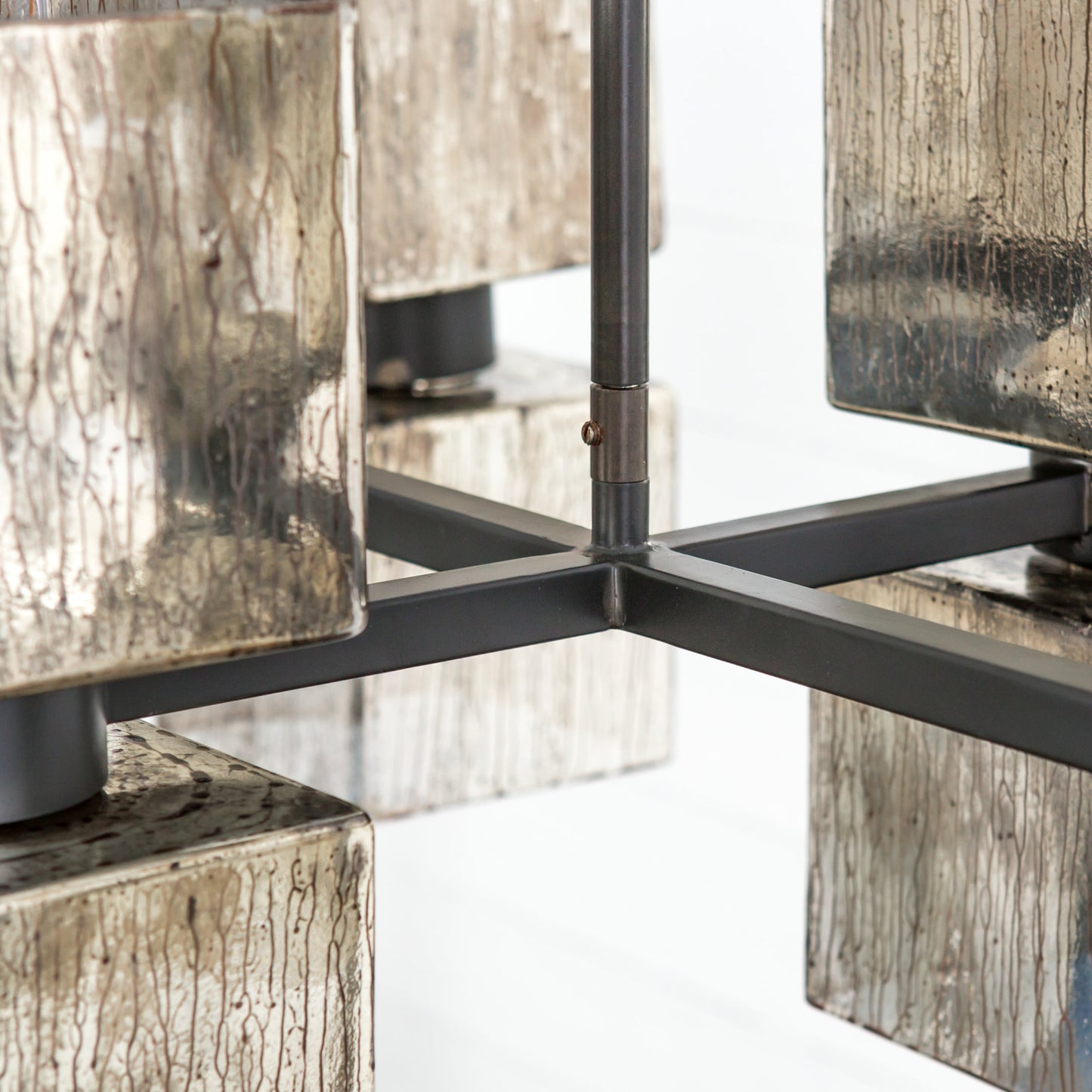 014 SR-368873 | Closeup | Ava Linear Chandelier by Four Hands in antiqued iron, aged metallic glass. Made from iron, glass in a modern style.