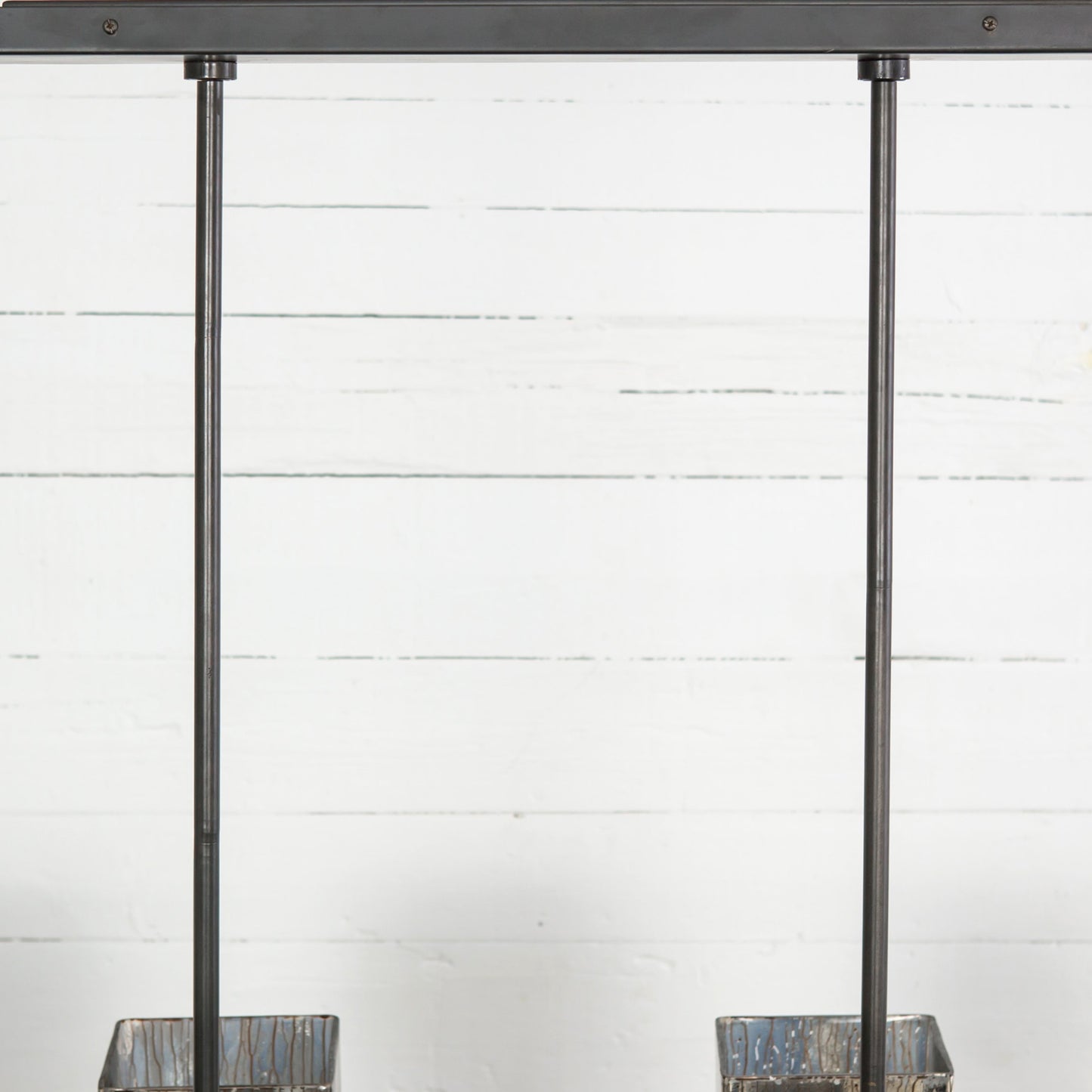 016 SR-368873 | Closeup | Ava Linear Chandelier by Four Hands in antiqued iron, aged metallic glass. Made from iron, glass in a modern style.