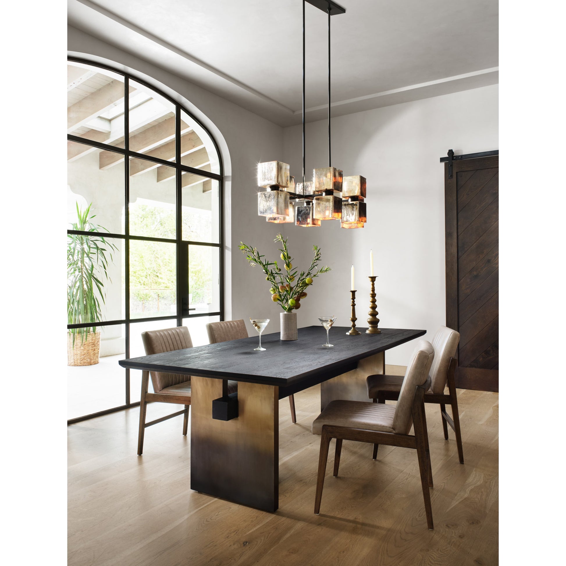 Ava Linear Chandelier by Four Hands in antiqued iron, aged metallic glass. Made from iron, glass in a modern style.
