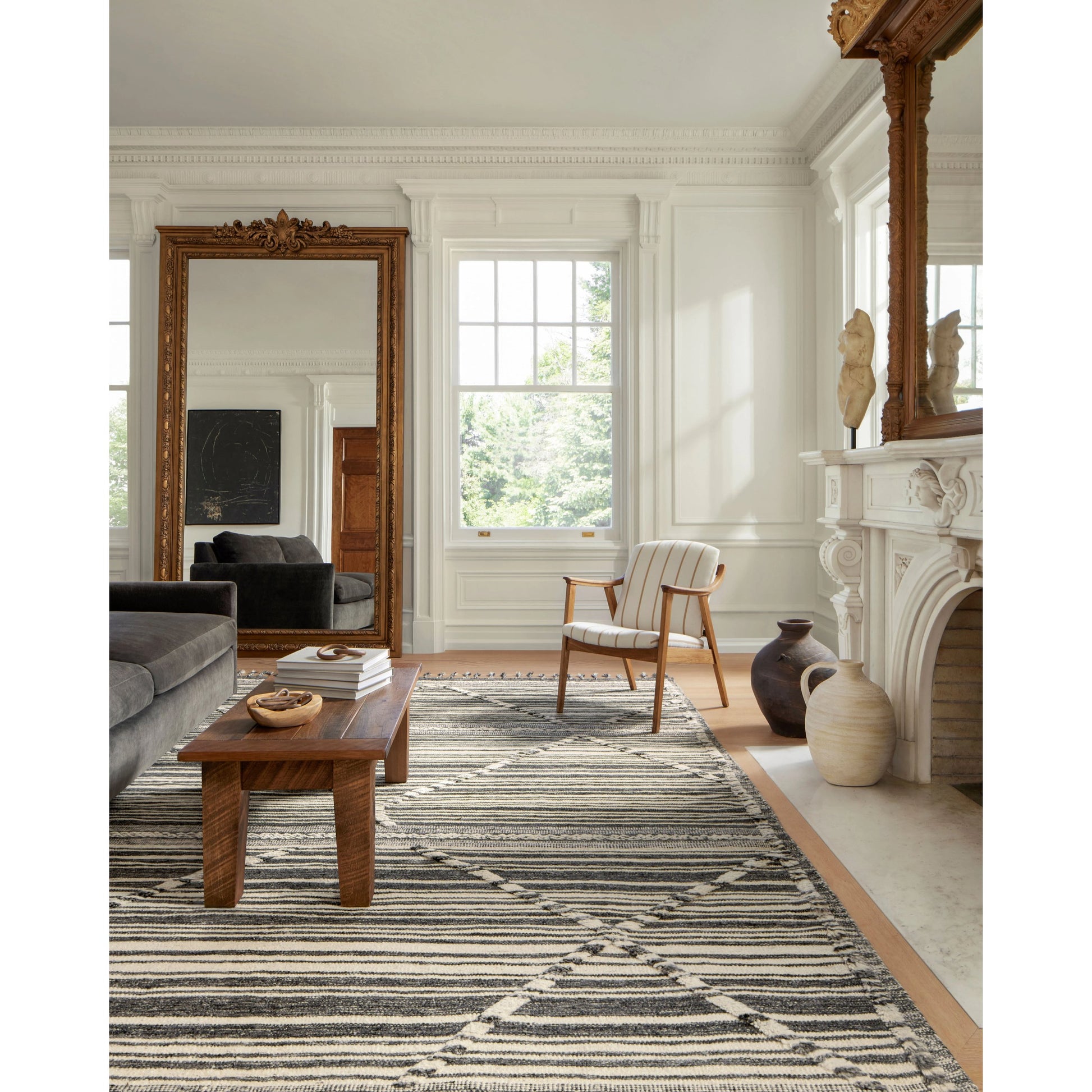 IMA-01 by Loloi in ivory, charcoal. Made from 100% wool in a rustic style.