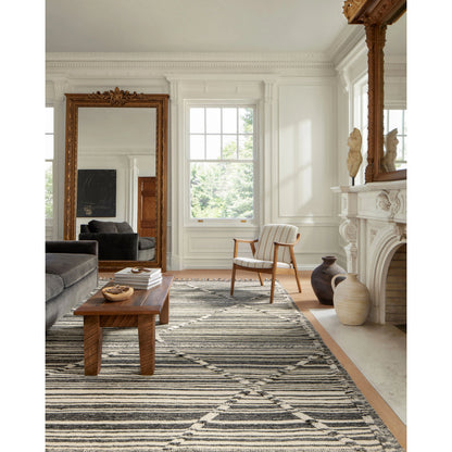 IMA-01 by Loloi in ivory, charcoal. Made from 100% wool in a rustic style.