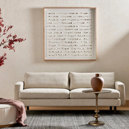 Marlow Matchstick Pedestal Table by Four Hands in matte brass. Made from aluminum in a modern style.