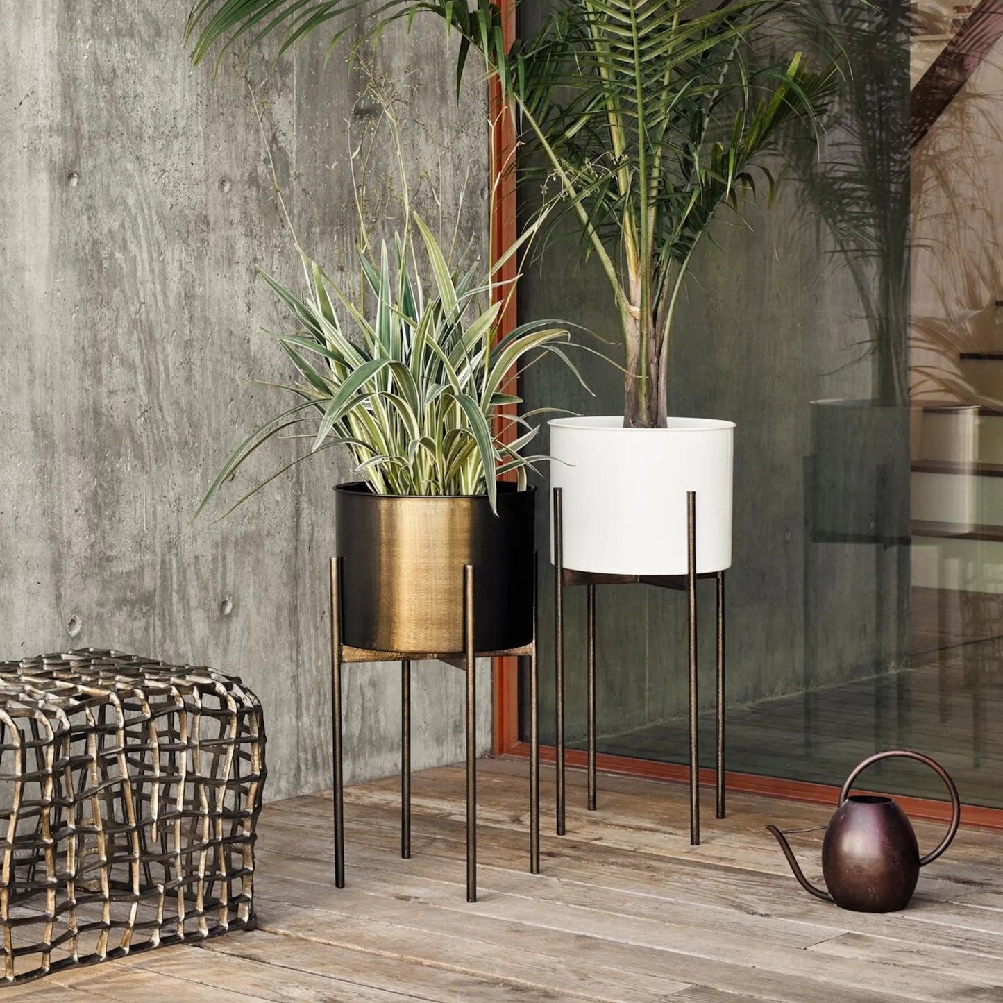 042 SR-809906 | Lifestyle | Jed Round Planter by Four Hands in weathered brass. Made from iron in a modern style.