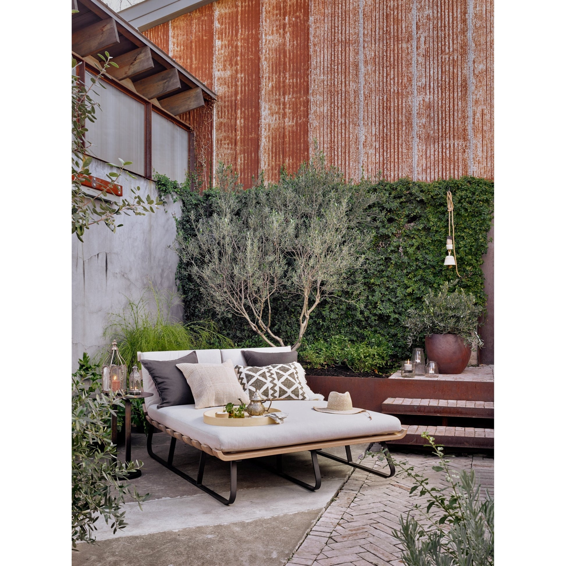 Douglas End Table by Four Hands. Made from aluminum, engineered hardwood in a modern style.