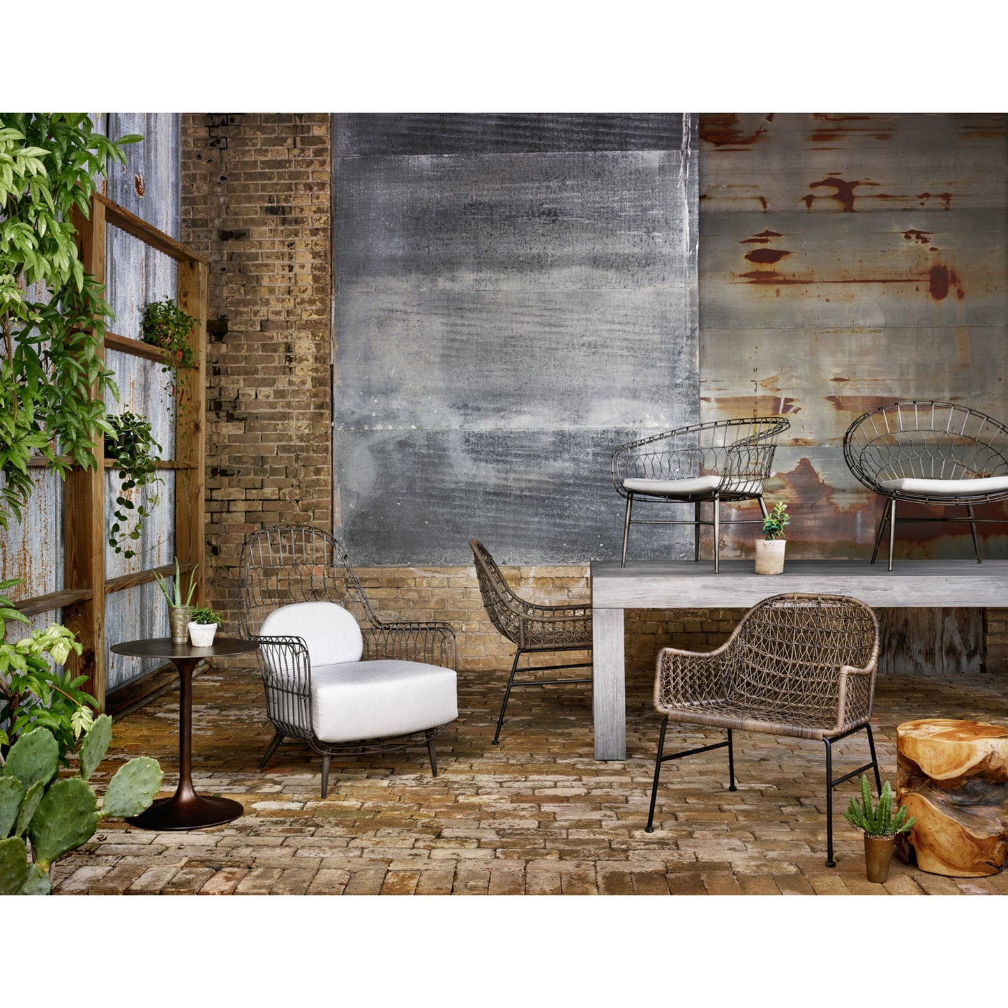 011 S-258385 | Lifestyle | Tulip Side Table by Four Hands. Made from aluminum in a modern style.