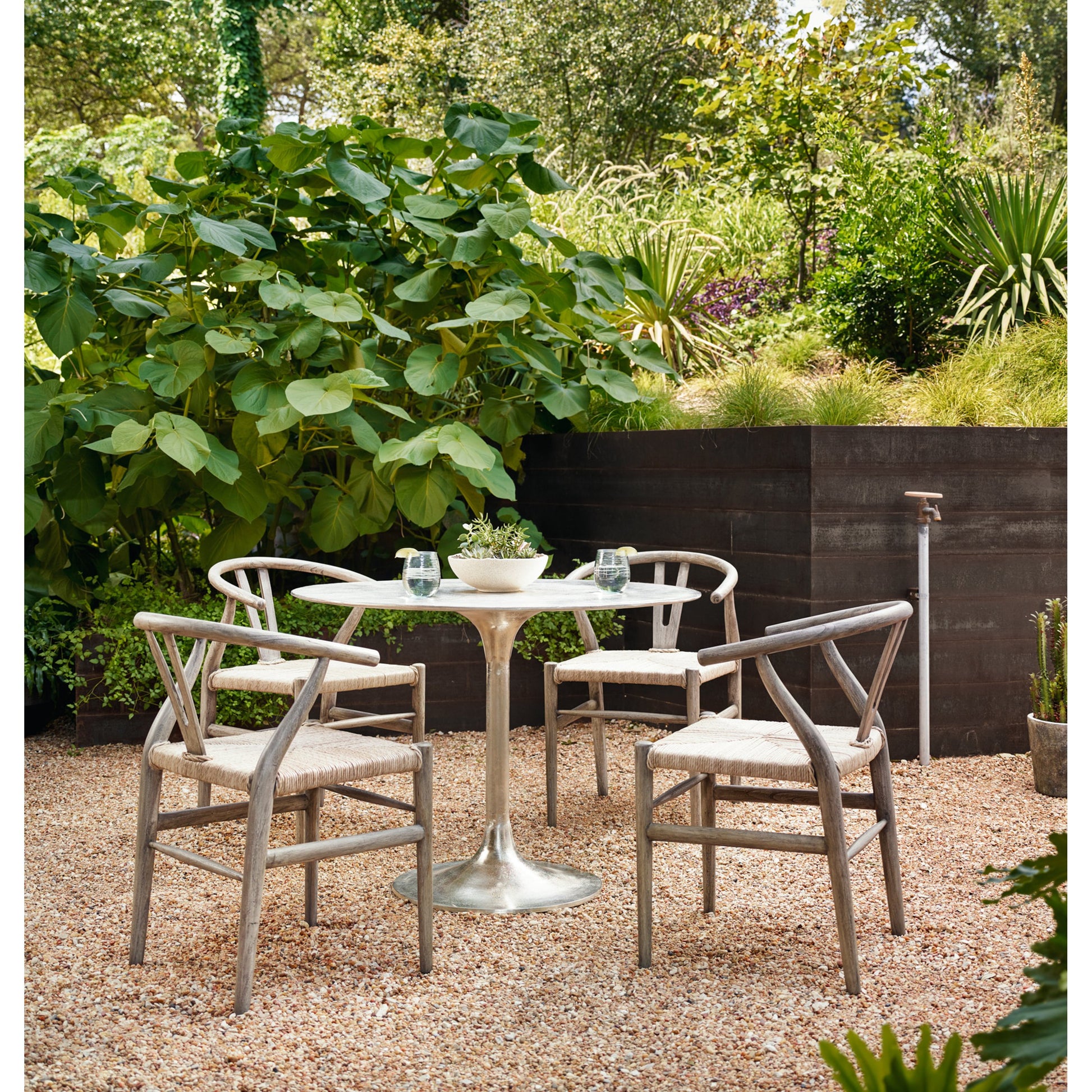 Simone Bistro Table by Four Hands. Made from aluminum in a modern style.